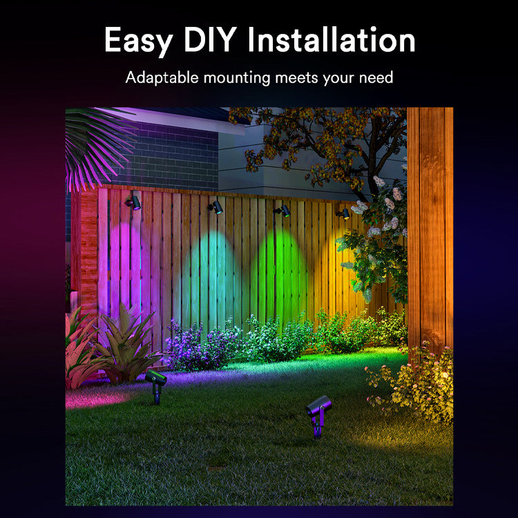 Lumary Smart Spotlights with vibrant colors shining on garden and fence, easy DIY setup.